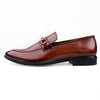 Brown leather loafer shoe on a white background