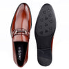 Brown leather loafer shoe with a black sole on a white background