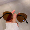 Sleek Round Metallic Sunglasses - SunglassesMart