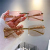 Panther Rimless Cut Edge Sunglasses - SunglassesMart
