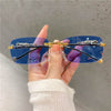 Panther Rimless Cut Edge Sunglasses - SunglassesMart