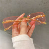 Panther Rimless Cut Edge Sunglasses - SunglassesMart